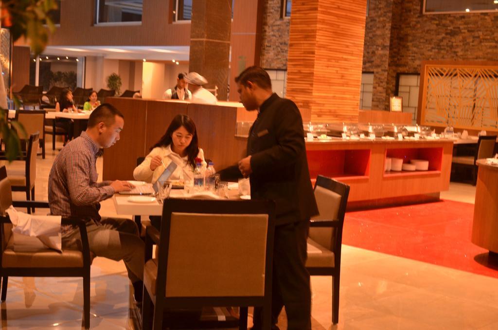 Anjushree Hotel Uddzsaín Kültér fotó